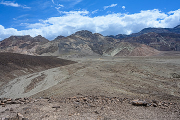 Death Valley, California / USA - May 25, 2019: Landscape in Death Valley on Artist Drive with beautiful colors, clouds moving on day time. 