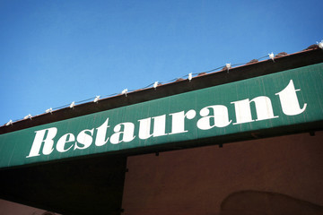 Fototapeta premium Aged and worn restaurant sign