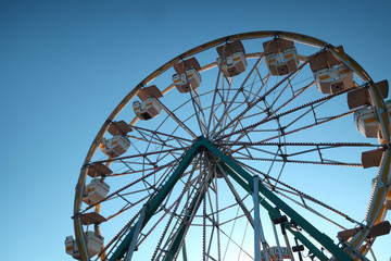 Fototapeta premium Aged vintage backlit Ferris wheel