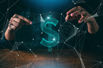 Fototapeta premium business man hand show something us dollar virtual sign dark blackground creativity ideas concept