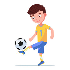 Boy soccer player kicking the ball on his leg