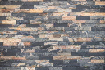 Natural rectangular stone brick wall pattern multi tone color for interior design building.