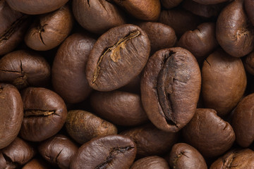 close up of dark brown roasted coffee beans