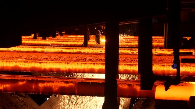 Steel billets continuous casting at a metallurgical plant.
