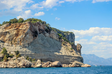 Fototapeta na wymiar Turkey, Kemer, rock off the Mediterranean coast