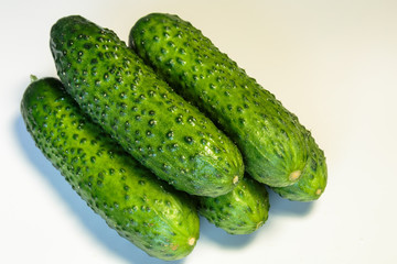 Green cucumbers. Fresh produce from the Farmers Market in early Summer.
