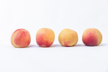 Beautiful color compositions of apricots in a line