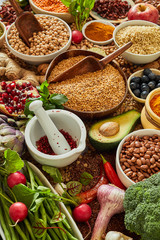 Healthy food background with spice and vegetables