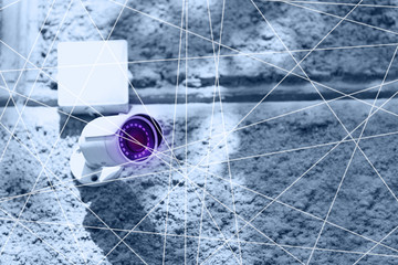 Modern security CCTV camera outdoors. Surveillance service