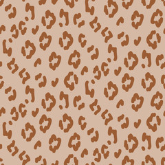Wild animal skin cheetah fashion stains seamless pattern brown texture.