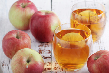 Two glasses with apple juice	