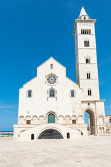 Fototapeta na wymiar Like a white ship in the middle of the sea. Trani, cathedral of San Nicola Pellegrino. Puglia. Italy