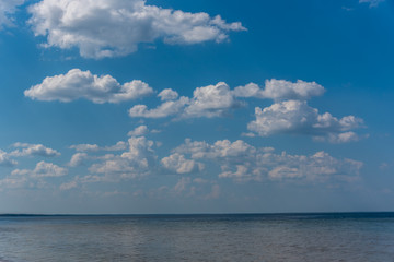 Naklejka na ściany i meble Cloudscape over a Beach at the Baltic Sea Coast in Latvia