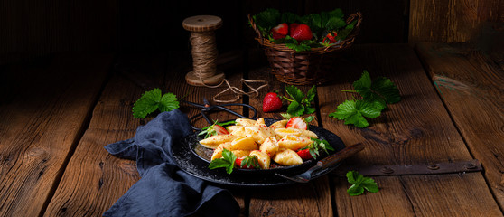 Kopytka - polish potato dumpling with strawberries