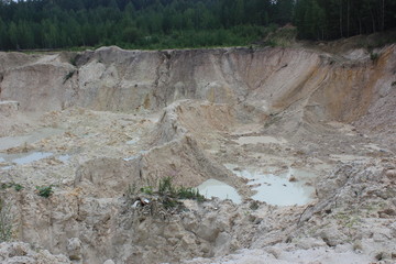 sand quarry in the forest in summer