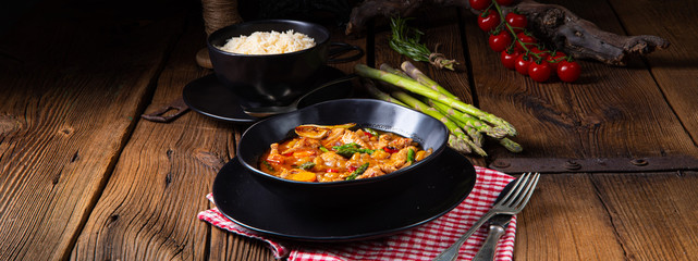 colorful turkey fricassee with asparagus and paprika