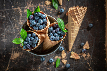 Sweet and fresh blueberries in waffels as ice cream concept