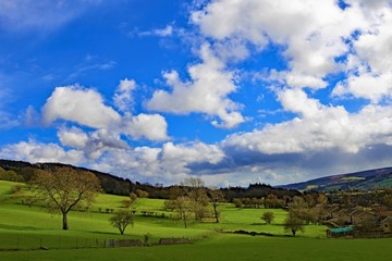 Fototapeta na wymiar Clouds gather over the walk from Bamford Edge, into Bamford village, Derbyshire