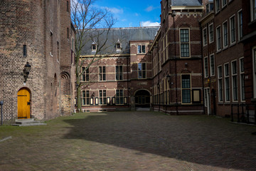 Den Haag, Netherlands, , a large brick building with grass in front of a house