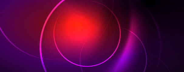 Shiny neon lights, dark abstract background with blurred magic neon light curved lines