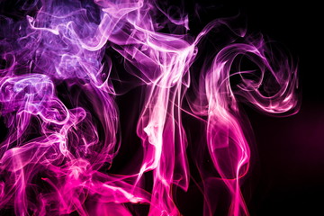 Colored smoke on black background