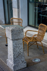 Den Haag, Netherlands, , a chair sitting in front of a building