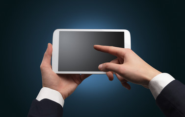Hand using tablet with no concept and empty space
