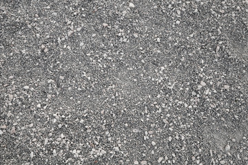 Gray gravel on the ground, photo texture