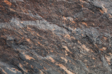 Natural dark gray and red stone background