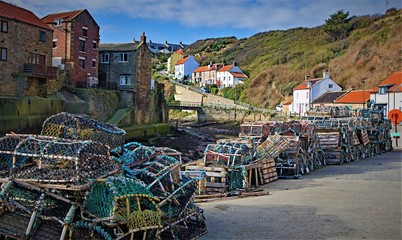 Obraz premium Lobster pots trail, in Staithes, near Scarborough, North Yorkshire