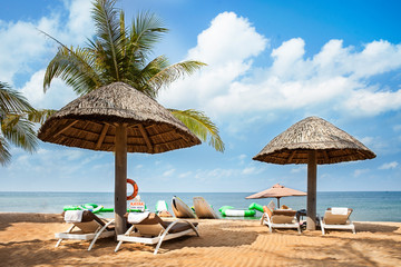 Relaxation area watching the sea at resort on the beach in Phu Quoc island in Vietnam. Blue sky. Beautifull sunny