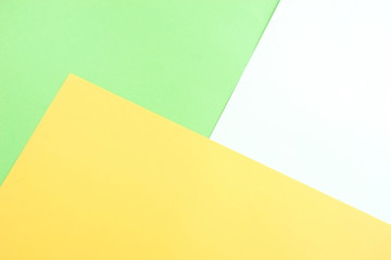 Abstract geometric paper background  green yellow trend colors. Minimal fashion mock up concept. Flat lay, Top view. Copy space