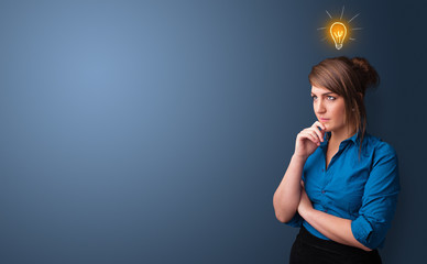 Young person looking for new idea with lighting bulb concept
