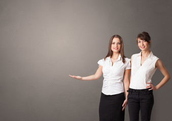 Young person presenting something with empty space
