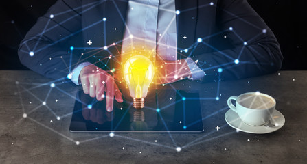 Business woman working on tablet with new idea and network concept
