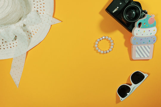 Assortment of items placed on a yellow surface