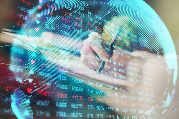 International business hud over woman's hands writing background. Concept of hard work. Double...