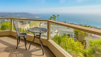 Panorama Balcony overlooking the lake and valley under bright blue sky on a sunny day