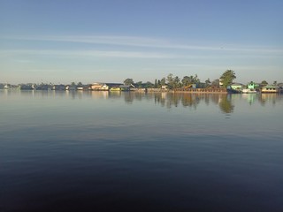 the scenery in river with the sky blue