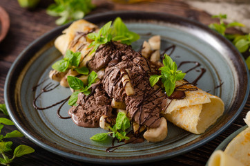 Decorated pancakes with chocolate ice cream