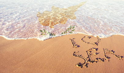 Beach sand, sea and flag Ciprus. I love Ciprus concept