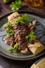 Decorated pancakes with chocolate ice cream