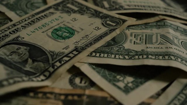 Rotating background of money dollars usa close up