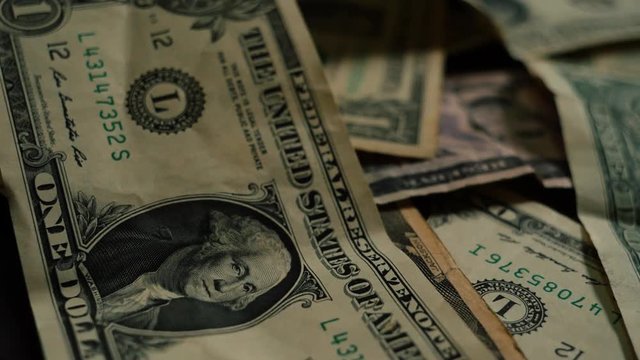 Rotating background of money dollars usa close up