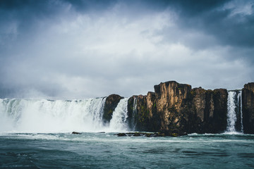 Fototapeta na wymiar Godafoss waterfall in Iceland with cloudy sky