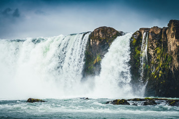 Godafoss waterfall in Iceland with cloudy sky