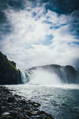 Godafoss waterfall in Iceland with cloudy sky