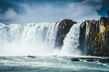 Godafoss waterfall in Iceland with cloudy sky