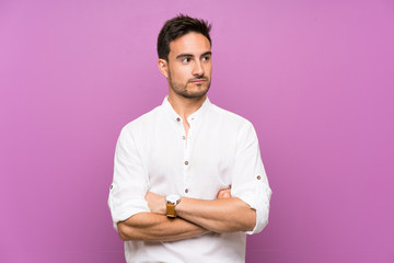 Handsome young man over isolated background portrait