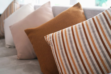 close up of backrest pillow on sofa